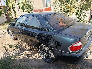 mazda kronos: Mazda 323: 1999 г., 1.5 л, Механика, Бензин, Седан — 2