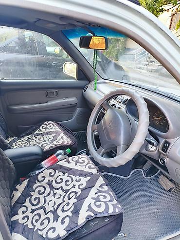 резиновое: Nissan Micra: 1998 г., Механика, Бензин, Хэтчбэк — 4