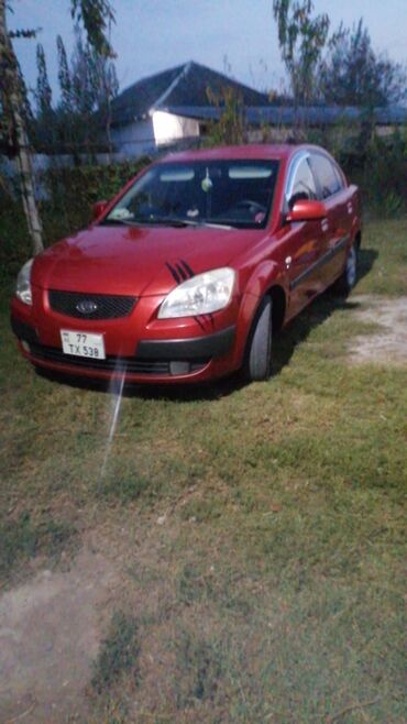 Kia: Kia Pride: 1.5 l | 2006 il Sedan — 7