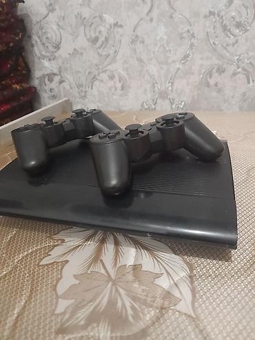 ваш массаж: Игровая приставка Sony PlayStation 3 Super Slim (черная) с двумя — 1