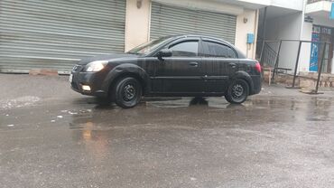 Kia: Kia Rio: 1.4 l | 2010 il Sedan — 12