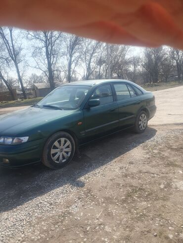 без первоначального взноса машина: Mazda Capella: 1997 г., 1.8 л, Механика, Бензин, Хетчбек