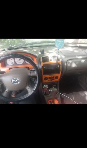 купить авто с кореи бу: Mazda 323: 2000 г., 1.6 л, Автоматтык, Бензин, Седан
