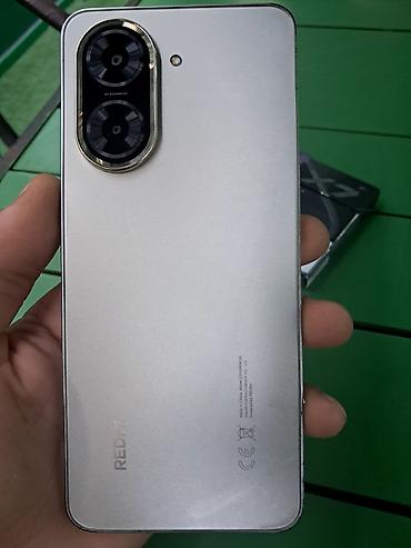 redmi 5a: Redmi A5, 128 GB, rəng - Qızılı, Sensor, Barmaq izi, Face ID — 1