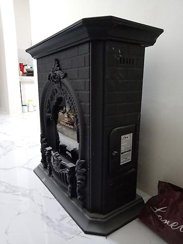 ucuz drel: BEHKARAN dekorativ soba/kamin görünüşlü qızdırıcı satılır. Məhsul — 1