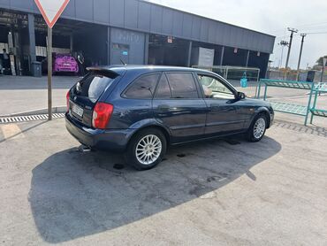 ремкомплект кулисы митсубиси спейс стар: Mazda 323: 2003 г., 1.3 л, Механика, Бензин, Универсал