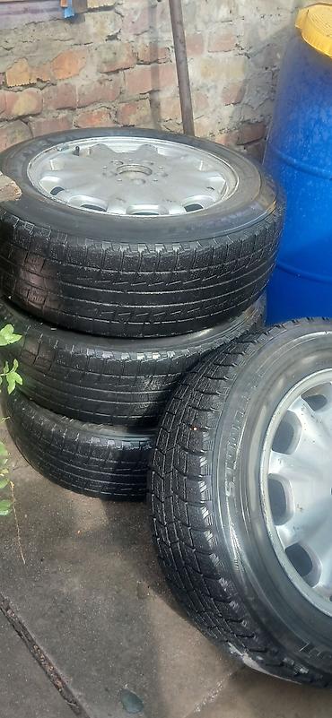 Комплект из 4 зимних шин Bridgestone Blizzak Revo1 на легкосплавных