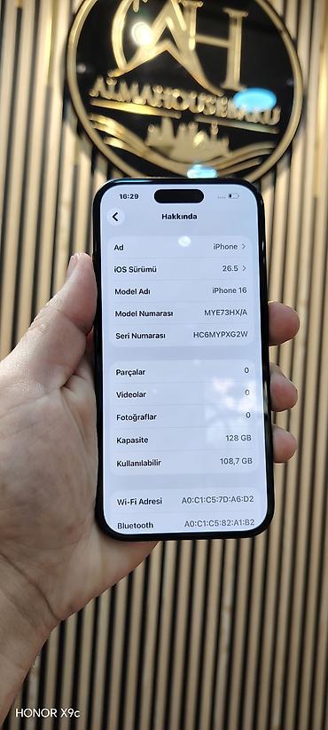 telefon iphone 11: IPhone 16, 128 GB, Black Titanium, Sənədlərlə, Simsiz şarj, Face ID — 2