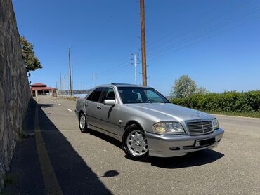 mersedes disk teker: Mercedes-Benz 240: 2.4 l | 1998 il Sedan