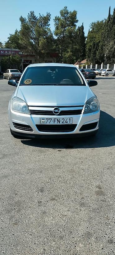 üstü açıq maşın: Opel Astra H, 5 qapılı hetçbek - Gümüşü rəng - Benzin mühərriki - Ön — 6