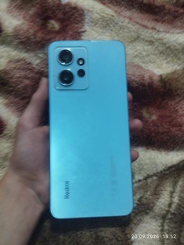 Redmi, Redmi 12, Б/у, 128 ГБ, цвет - Голубой at lalafo.kg Redmi, Redmi 12, Б/у, 128 ГБ, цвет - Голубой