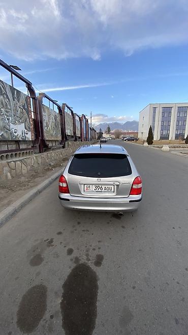 Mazda: Mazda 323: 1998 г. — 2