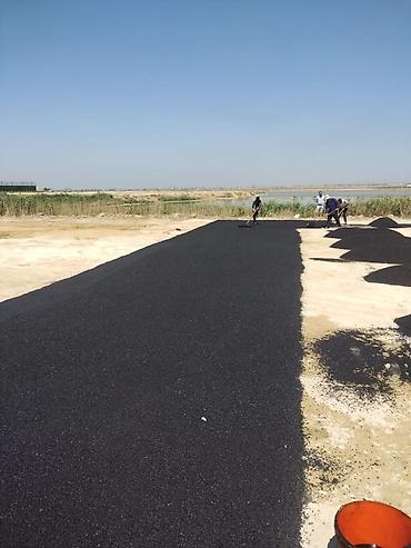asfalt isleri: Keyfiyyetli asfalt işleri gorulur.Binalarin heyetine,yollara kucelere — 7