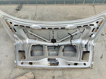 Другие детали кузова: Панель задняя/рамка проёма багажника с посадочным местом под замок + — 10