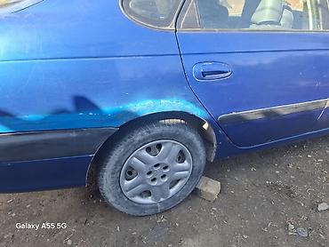 обшивки на бмв: Toyota Avensis: 1998 г., 1.8 л, Механика, Бензин, Лифтбек — 10