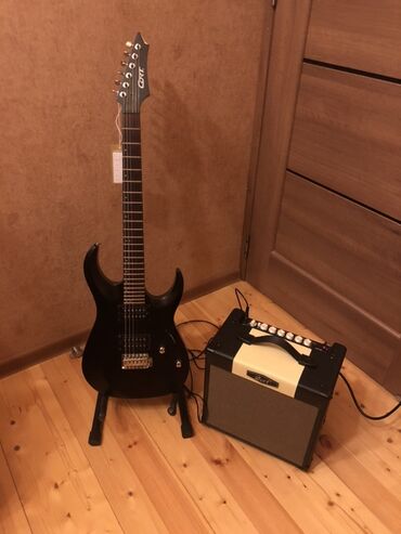 İdman və istirahət: Cort elektro gitara seti Istifade edilmeyib! Sete daxildir: -elektro