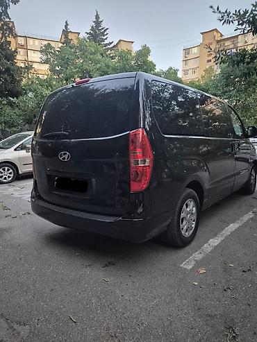 starex: Hyundai H-1 (Grand Starex): 2.5 l | 2010 il Mikroavtobus — 5