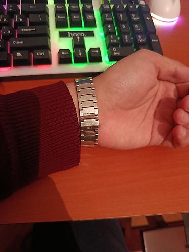 saatlari: İşlənmiş, Qol saatı, Tissot, rəng - Gümüşü — 2