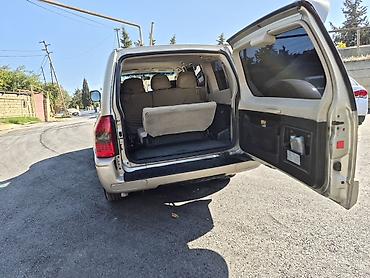 mitsubishi pajero 2000: Mitsubishi Pajero SUV - Korpus: qızılı/bej rəng, 5 qapı, yan — 4