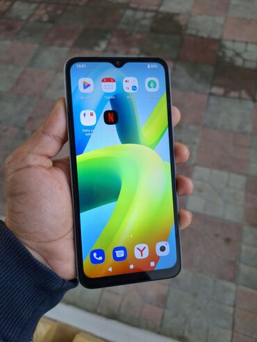 telefon smartfon: Xiaomi Redmi A1 Plus, 32 GB, rəng - Göy, 
 Düyməli, Barmaq izi