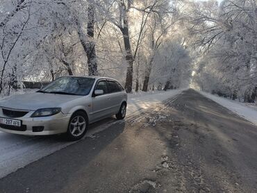 мазда дамио: Mazda 323: 2003 г., 1.6 л, Механика, Бензин, Хетчбек