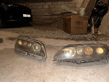 Передние фары: Передняя левая фара Mazda Оригинал — 8