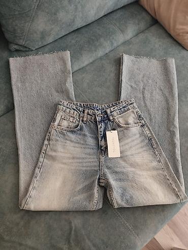 Cinslər: TrendYol qadın cins şalvarı - Model: geniş kəsimli (wide leg), düz — 4