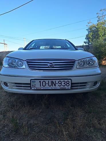 hyundai i30 oluxanası: Nissan Sunny: 1.6 l | 2007 il Sedan — 2