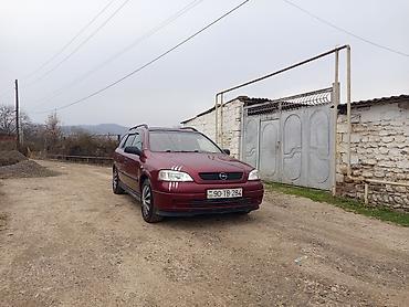 tap az opel vectra: Opel Astra универсал kuzovlu minik avtomobil. Rəngi tünd qırmızı — 10