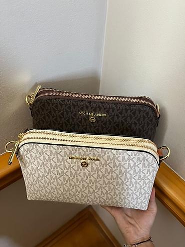 Сумка-кроссбоди Michael Kors Jet Set из фирменного монограммного