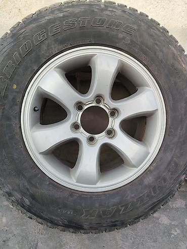 139: 275/65R17 Комплект колес Toyota на оригинальных литых дисках. Состав — 4