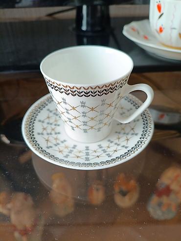Наборы посуды: Набор чайных пар (чашка + блюдце), фарфор. Состав и дизайн: - — 1