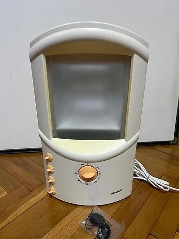 Ostali aparati za negu lica: Solarijum lampa za lice (kućni mini-facial tanner) Opis: - Kompaktna — 6