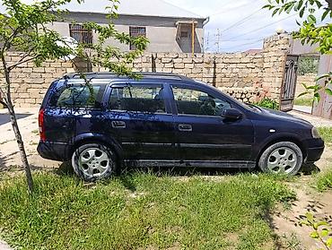 opel astra 2015: Opel Astra Caravan (universał) – tünd mavi rəng, 5 qapı, geniş baqajlı — 1