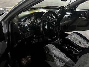 Mazda: Mazda 323: 2003 г., 1.6 л, Ручные, Бензин, Универсал — 7