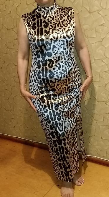 arqanza parça: Uzun leopard printli don - Model: Yüksək boğazlı, qolsuz, bədənə — 1