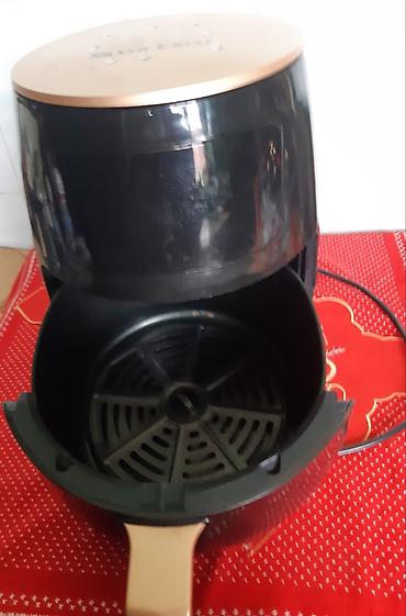 Ostali kuhinjski aparati: Friteza na vruć vazduh (air fryer) Model:SilverCrest S-18.Zapremina — 2