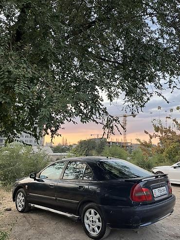 evo 2: Mitsubishi Carisma: 1999 г., 1.8 л, Автомат, Бензин, Седан — 8