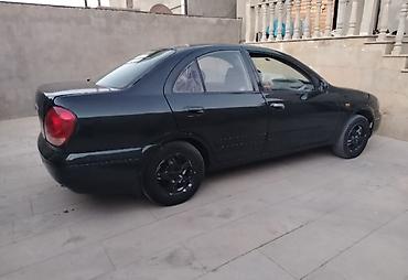 1997 nissan sunny: Nissan Sunny: 1.3 l | 2005 il Sedan — 5