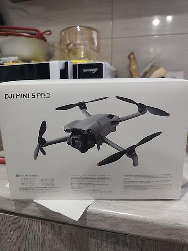 дрон для детей с камерой: DJI Mini 5 Pro — компактный складной квадрокоптер для фото и видео с — 1