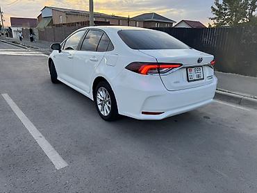 byd e6: Toyota Corolla: 2021 г., 1.8 л, Вариатор, Гибрид, Седан — 2