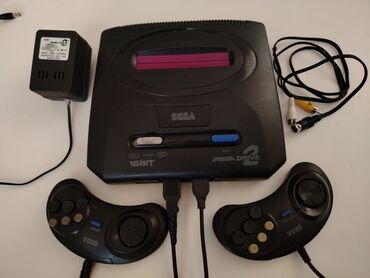 Сковородки: Sega mega drive2 əla işləyir yaddaşında oyunlar var Sonic futbol və