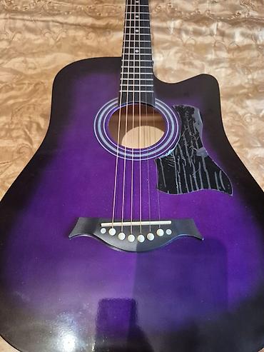 gitara tornado: Komplektdə Çexolu, əlavə simləri, mizrabı, remeni və not dəftəri var — 2