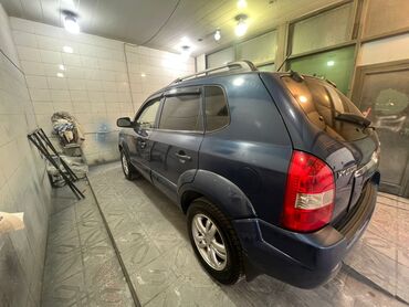 Hyundai: Hyundai Tucson: 2.7 l | 2006 il Krossover — 4