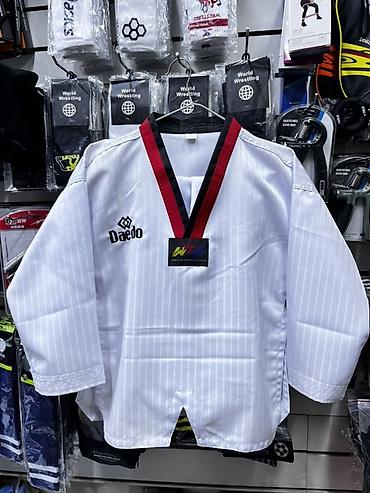 Кимано для таэквондо( добок) Ткань: полиэстер 100% Размер:100-180см