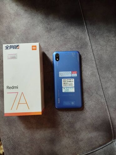 безрамочные телефоны: Xiaomi, Redmi 7A, Б/у, 32 ГБ, цвет - Синий, 2 SIM