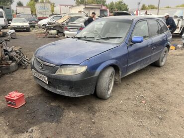 передний бампер тайота витц 2002 г: Mazda Familia: 2002 г., 1.6 л, Автомат, Бензин, Хетчбек