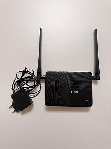 Модемы и сетевое оборудование: Wi‑Fi роутер ZyXEL Keenetic Lite III (Rev. B) - Диапазон 2.4 ГГц — 1
