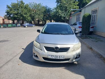 фольксваген т4 дизель: Bu gümüşü rəngli Toyota Corolla sedanı etibarlı nəqliyyat vasitəsi