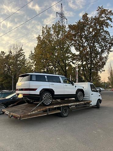 Услуги эвакуатора: С манипулятором, С частичной погрузкой, С лебедкой — 1